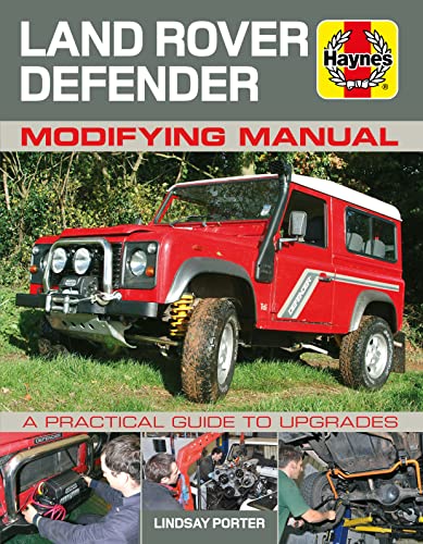 Red Land Rover Defender modifying manual with vehicle and repair photos.