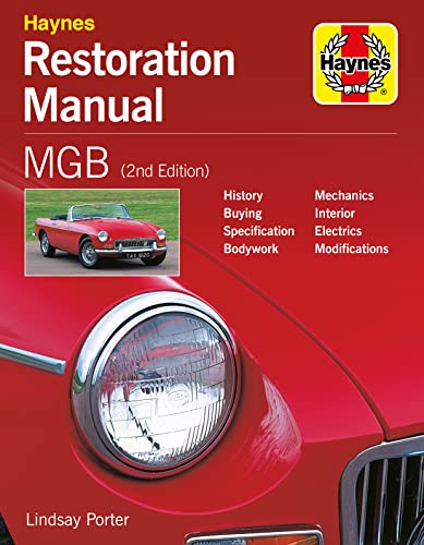 Red Haynes restoration manual for MGB, featuring a classic roadster.