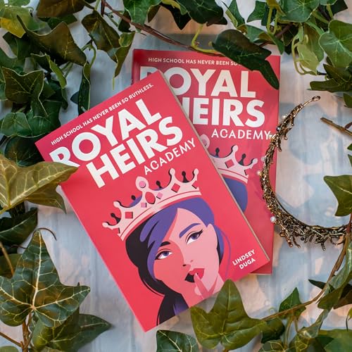 Pink book cover with a crown and portrait, surrounded by greenery.