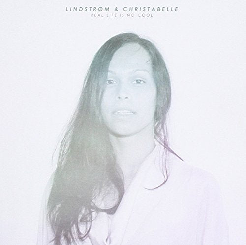 CD cover with a faded portrait of a woman with long dark hair.