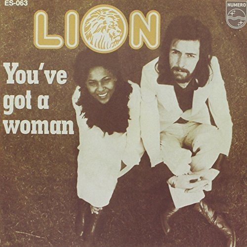 1970s vinyl record cover featuring a man and woman smiling.
