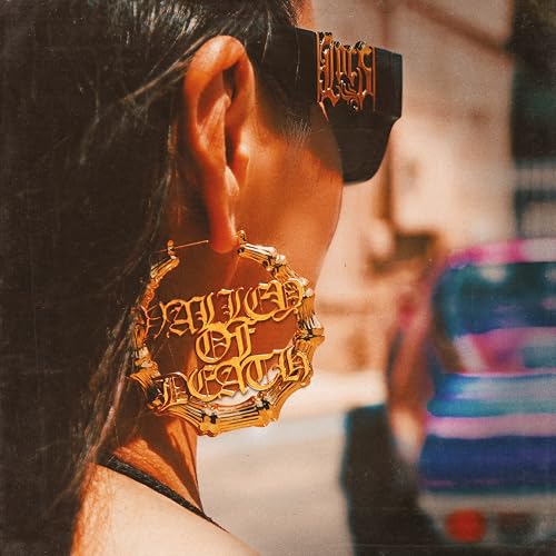 Album cover featuring a person in sunglasses and gold jewelry.