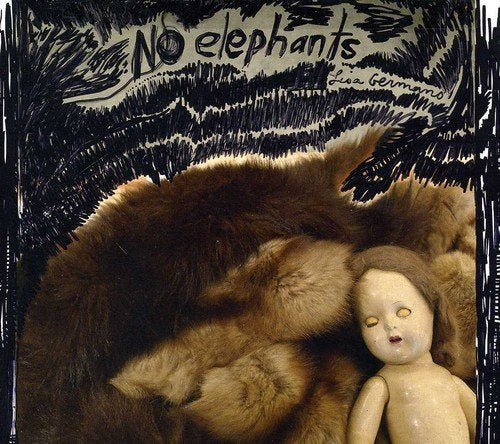 CD cover: lion fur and antique doll against black scribbles.