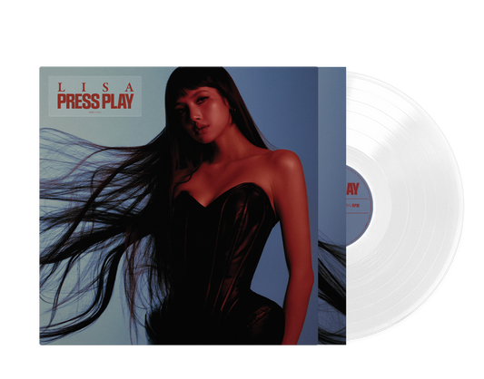 Lisa’s “Press Play” vinyl record cover and a translucent white disc.