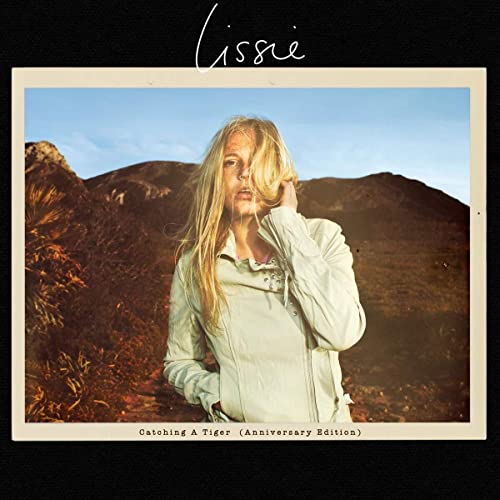 Album cover for Lissie’s “Catching A Tiger (Anniversary Edition)” featuring a woman.