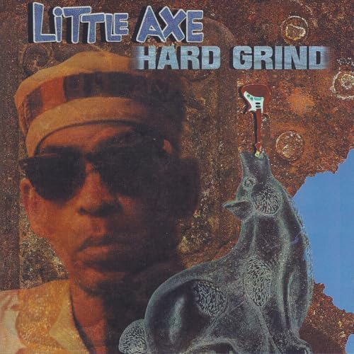 Album cover featuring a man in sunglasses and a wolf howling at a guitar.