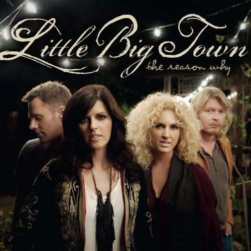 The four members of Little Big Town stand together under string lights at night.