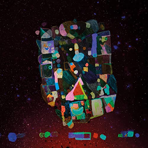 Abstract colorful collage face on a dark, speckled background.