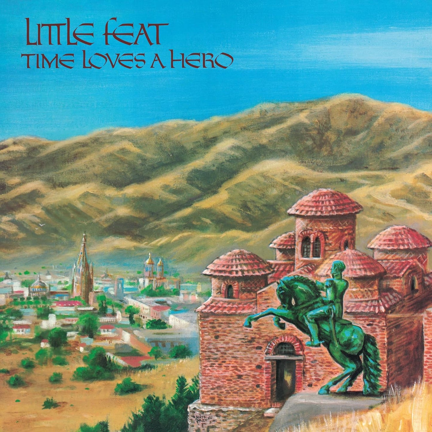Album cover: Little Feat’s “Time Loves A Hero” with a painted landscape.