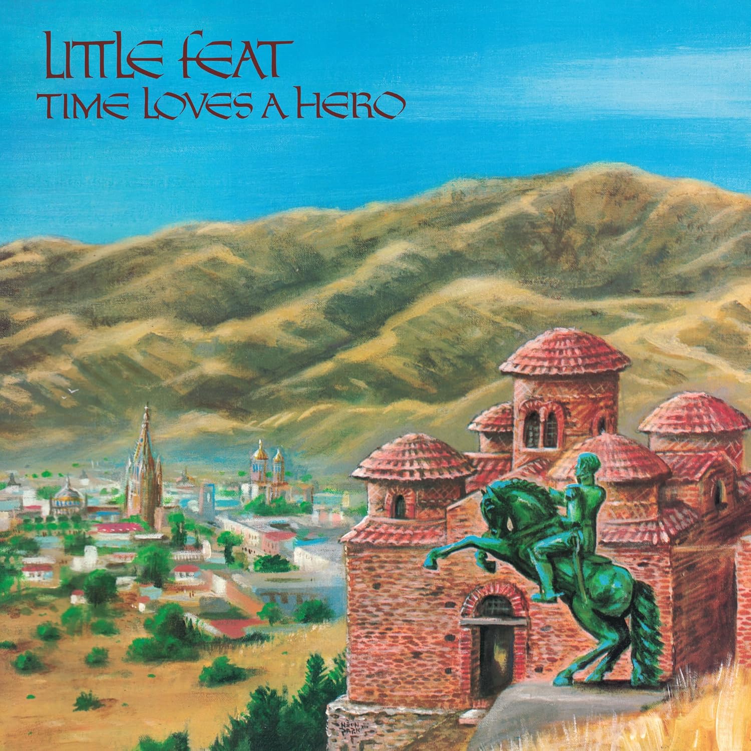 Album cover: Little Feat’s “Time Loves A Hero” with a painted landscape.