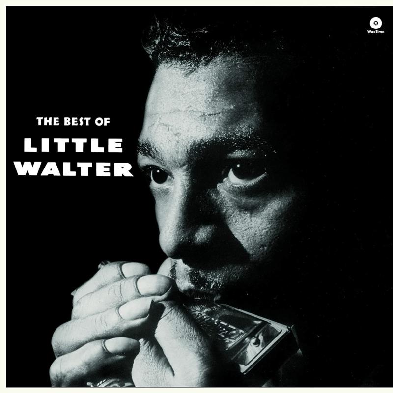 Black and white portrait of Little Walter playing a harmonica on a vinyl cover.