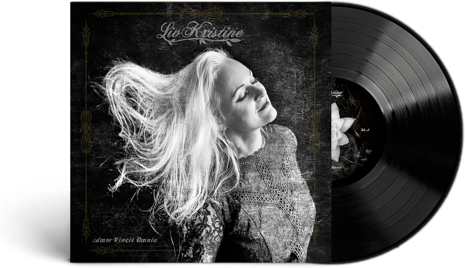 Liv Kristine album cover with a woman and vinyl record shown.
