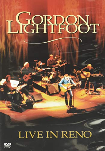 Gordon Lightfoot performing live on stage with his band in a concert setting.