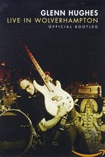 Glenn Hughes playing a white guitar on stage, DVD cover.