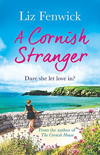 Book cover: woman overlooking a Cornish bay, blue sky, pink flowers.