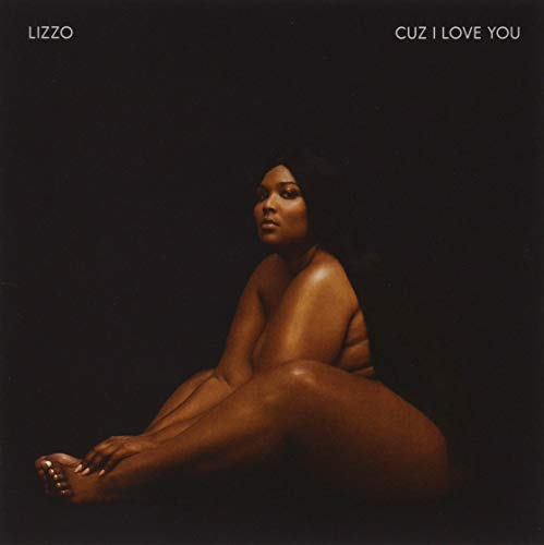 Lizzo album cover, “Cuz I Love You,” showing a seated woman in low light.