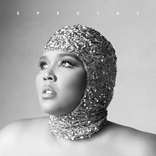 Black and white portrait of Lizzo wearing a sequined headpiece with the word SPECIAL above.