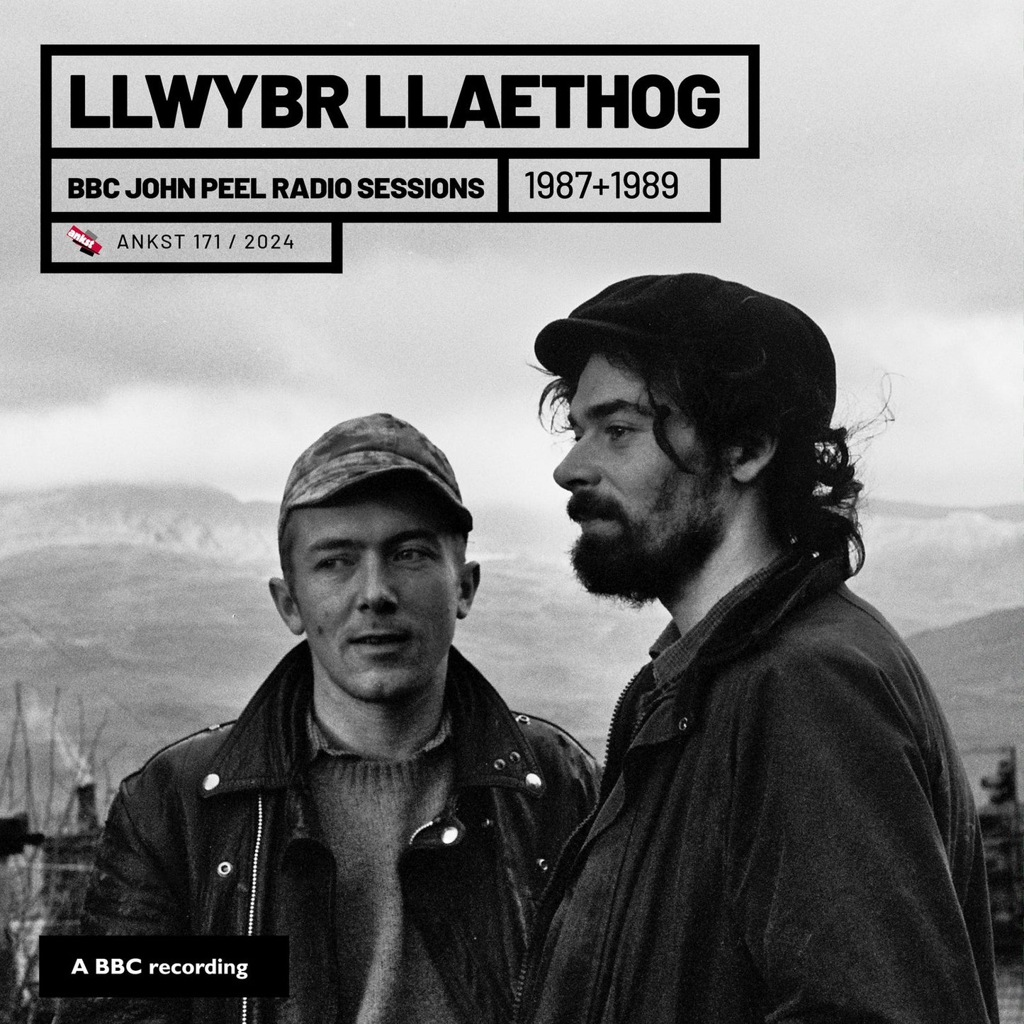 Black and white album cover featuring two men and text "Llwbyr Llaethog".