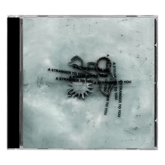 CD case for Loathe’s “A Stranger To You” with blurred, abstract imagery.