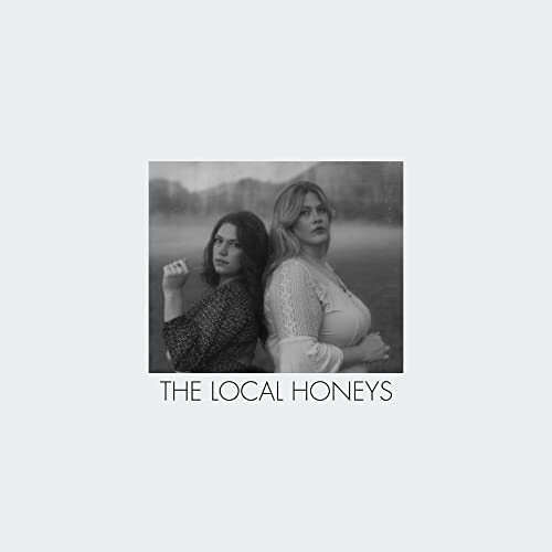 Black and white portrait of two women with album title below.