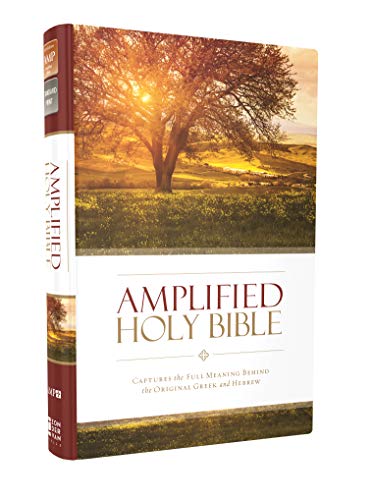 Hardcover Bible with a tree on the cover, white spine with red text.