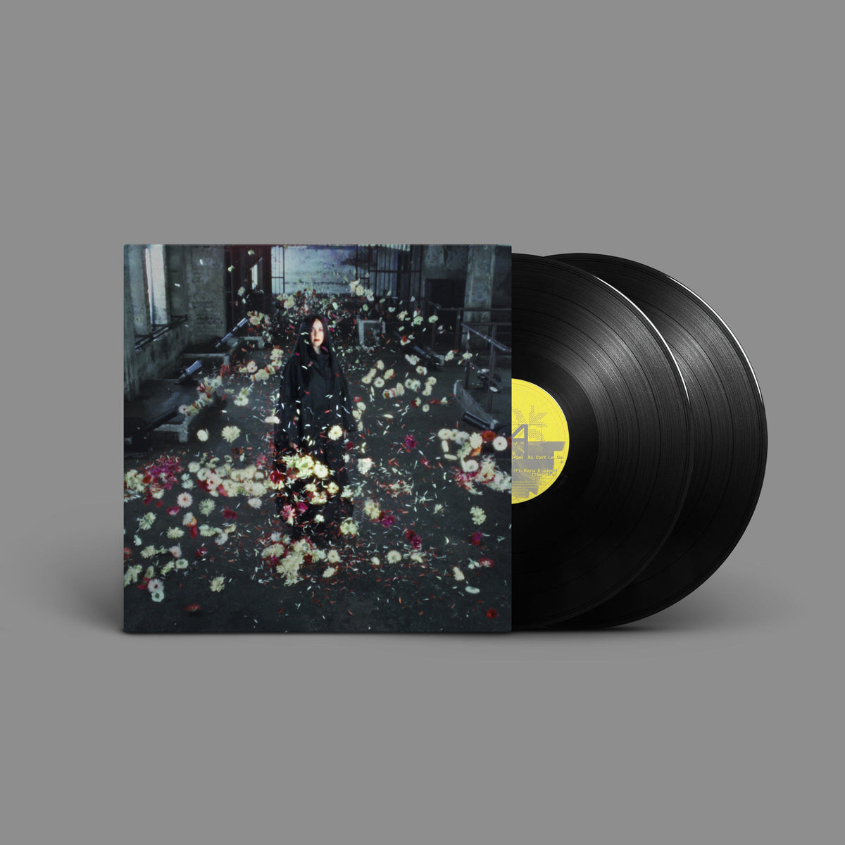 Vinyl record of Logic1000’s “Mother” with a woman in a floral scene.