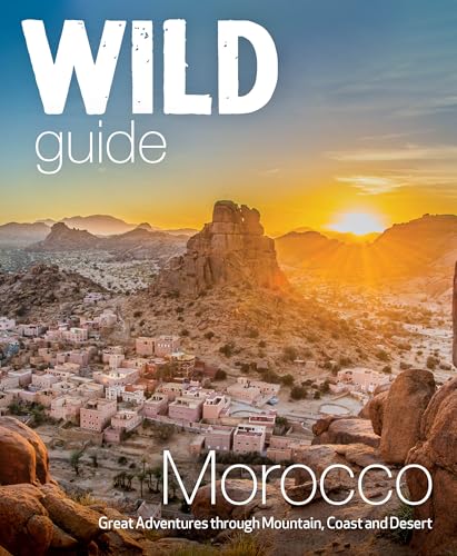 Book cover featuring a Moroccan village and rocky mountains at sunset.