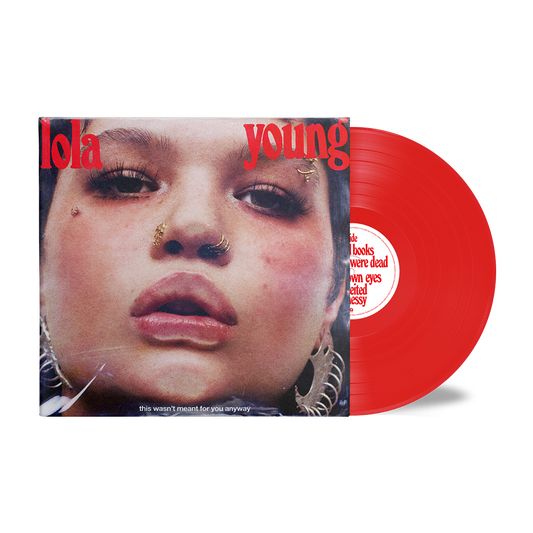 Close-up portrait of Lola Young with facial piercings and large earrings on vinyl cover.