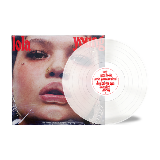 Lola Young album cover: close-up portrait with gold facial adornments.