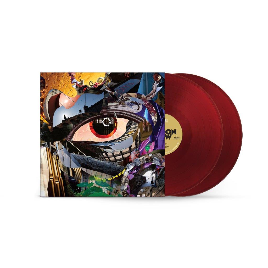 "Two maroon vinyl records with a colorful, abstract album cover featuring a large eye."
