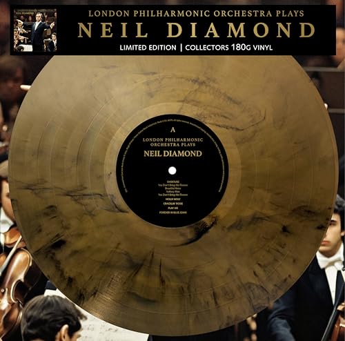 Marbled gold vinyl record with orchestra musicians in background.