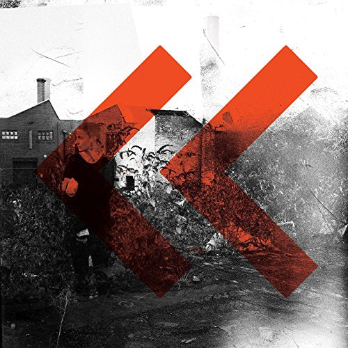 Album cover with a figure near buildings, overlaid with red angled stripes.