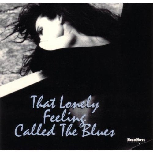 Black and white CD cover with a woman and album title text.