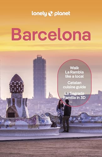 Colourful travel guide book with Barcelona cityscape and tourist information on the cover.