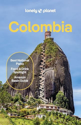 Lonely Planet Colombia travel guide cover featuring the stone monolith El Peñol with stairs.