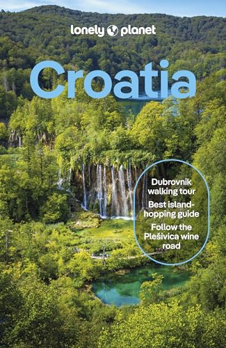 Lonely Planet Croatia travel guide featuring a waterfall and turquoise lake in a forest.