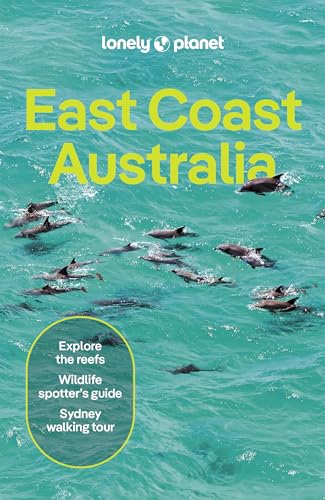 Lonely Planet East Coast Australia guidebook cover featuring a pod of dolphins in turquoise water.
