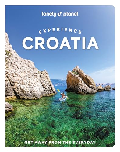 Lonely Planet Croatia guidebook cover with kayaker in clear turquoise water.