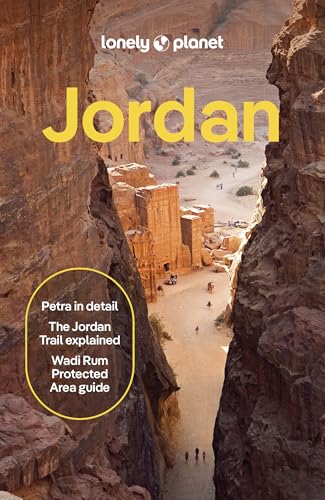 Lonely Planet Jordan guidebook cover showing a canyon path leading to ancient stone structures.