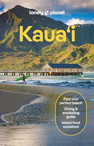 Lonely Planet Kauai guidebook cover with beach, mountains, and a surfer.