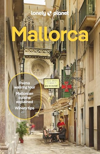Lonely Planet Mallorca guidebook cover showing a narrow street in Palma with outdoor seating.
