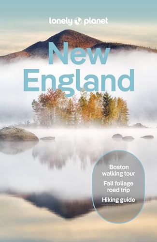 Lonely Planet guidebook for New England, featuring a misty mountain landscape.