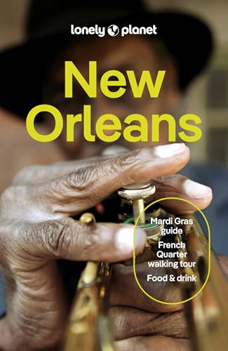 Lonely Planet New Orleans guidebook cover featuring a musician with a trumpet.