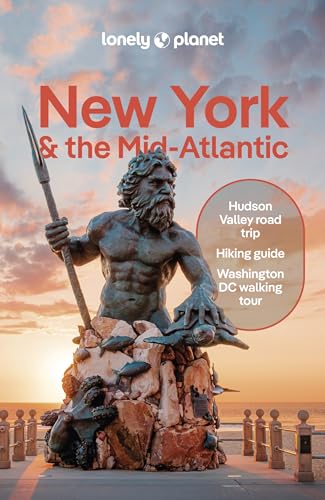 Lonely Planet travel guide cover featuring a statue and sunset.