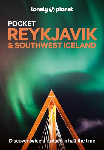 Lonely Planet travel guide cover with aurora borealis and bridge image.