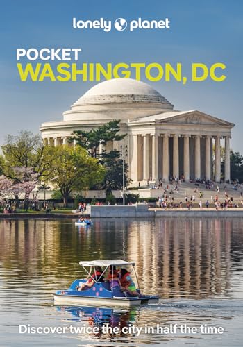 People in a pedal boat on the Tidal Basin with the Jefferson Memorial behind.