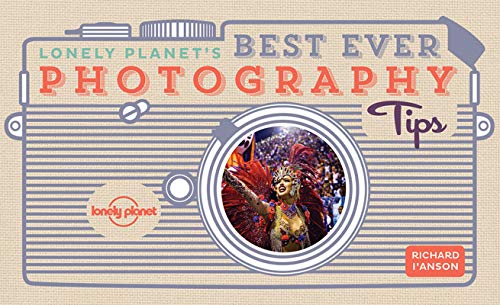 Book cover with camera illustration and vibrant festival photograph.