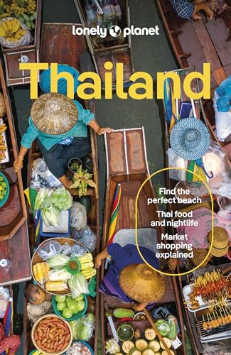 Aerial view of people in wooden boats selling produce at a floating market.