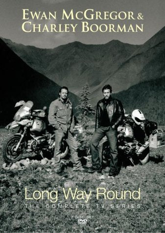 DVD cover for "Long Way Round" featuring two motorcyclists and mountains.