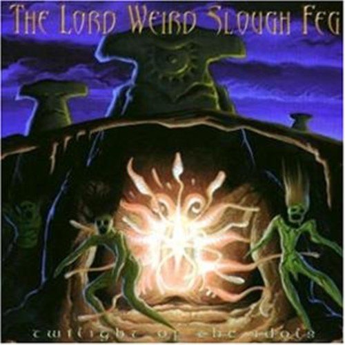 Album cover featuring two green figures dancing before a glowing light in a cave.
